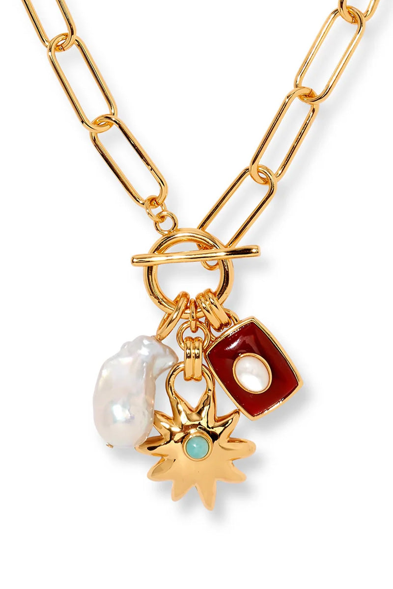 HELIOS CHARM NECKLACE IN SEA