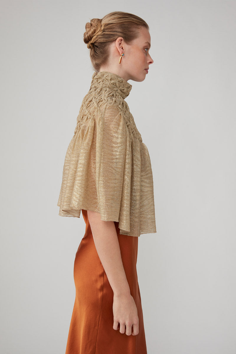 HANDSMOCKED CAPE - GOLD